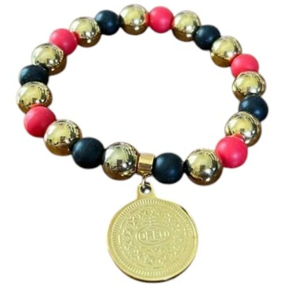 Rustic Cuff "Oreo" Logo Stainless and Beaded Stretch Bracelet EUC - Picture 1 of 7